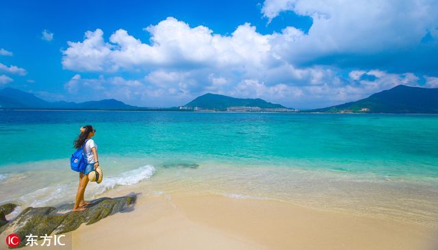 当你在朋友圈狂“晒”雪景 海南人民却在美美晒日光