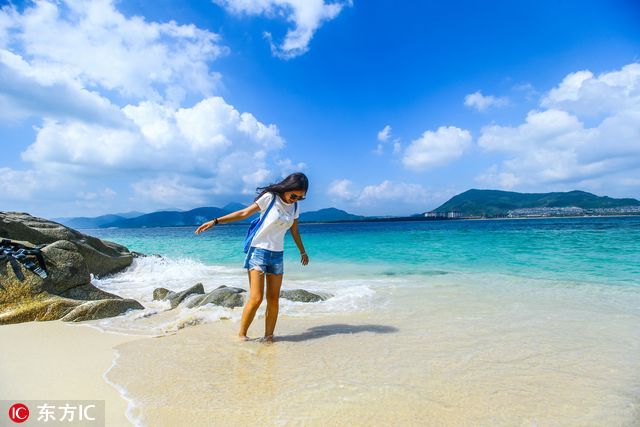 当你在朋友圈狂“晒”雪景 海南人民却在美美晒日光